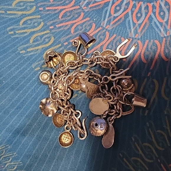 Vintage sterling silver southwestern theme charm bracelet